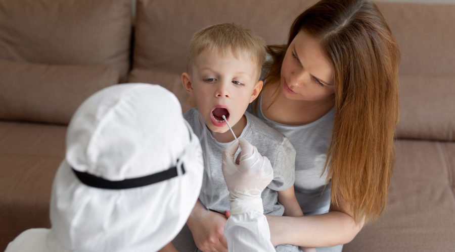 doctor-takes-bud-from-child-mouth-to-analyze-the-s-2023-01-06-20-06-04-utc